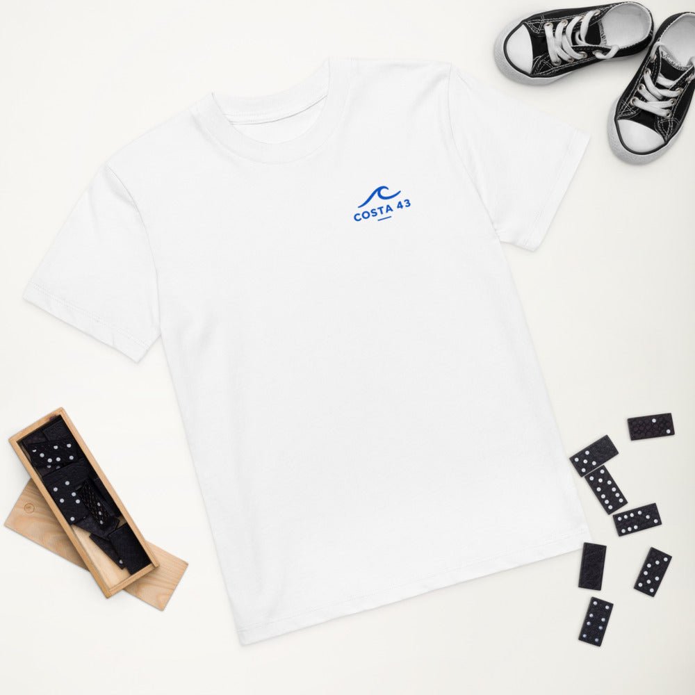Camiseta de niño Bandon Beach niño de Costa 43, sobre una mesa